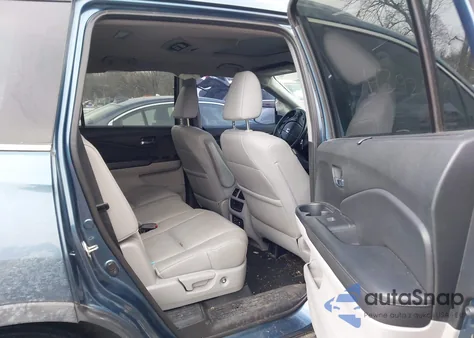 2017 Honda Pilot Touring z USA, uszkodzony, nr VIN 5FNYF6H95HB028638